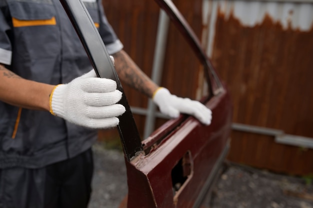 side-view-man-holding-car-door_23-2149714263