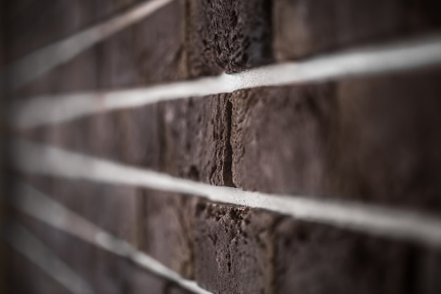 beautiful-brick-wall-dark-brown-closeup_169016-4053