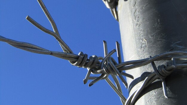 low-angle-view-metallic-structure-against-clear-blue-sky_1635904-446